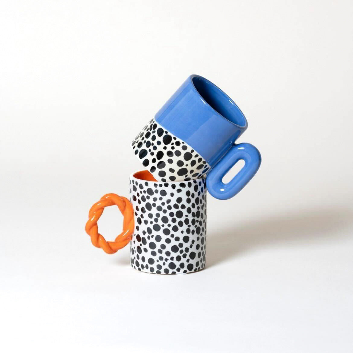 Twiggy Hola Bola Que Rico mug in Orange & Black
